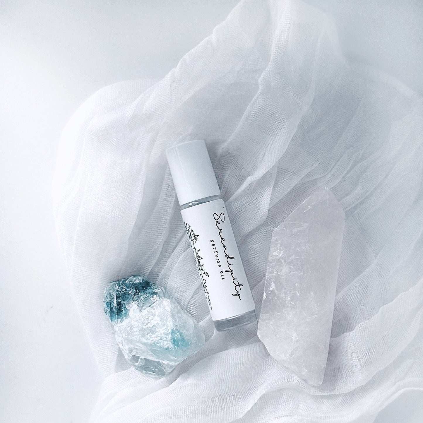 perfume roll on bottle with white cap