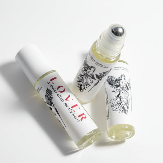 Two bottles of 'LOVER' on a white background