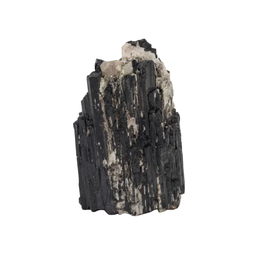 Mineral specimen with black and white textures on a gray background