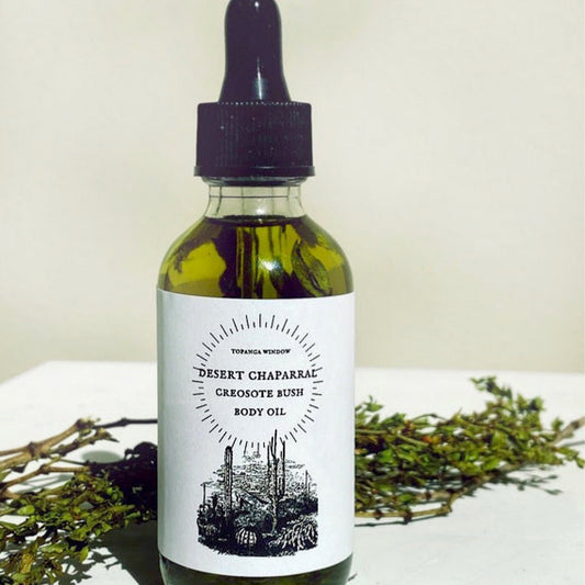 CREOSOTE  INFUSED OIL  IN A GLASS DROPPER BOTTLE.  aDDED CREOSOTE LEAVES INSIDE OF EACH BOTTLE. ORGANIC AND NATURAL SKINCARE