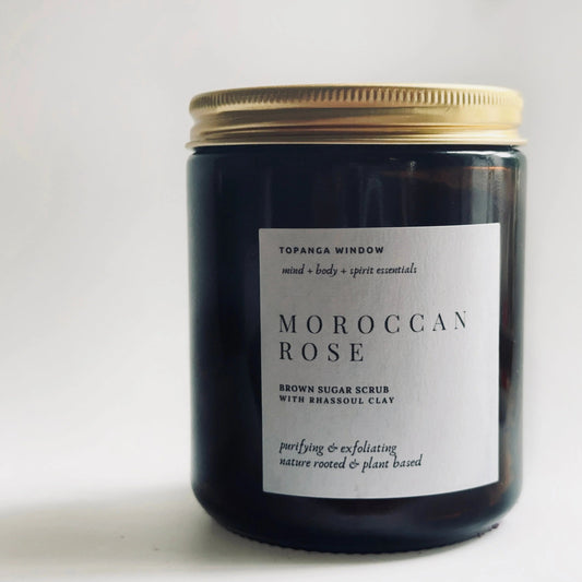 Jar of Moroccan Rose brown sugar scrub with Rhassoul clay on a white background